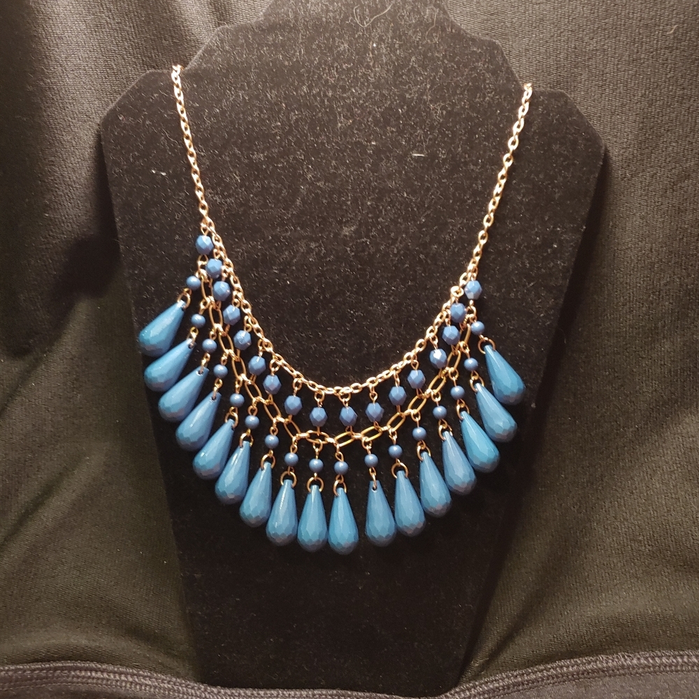 9 in blue beaded necklaces
